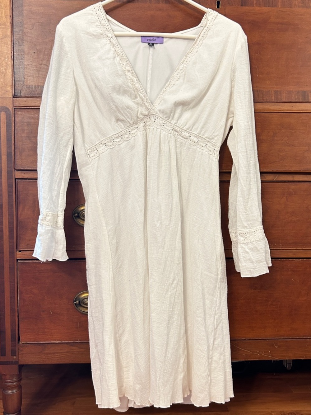 Lace-trimmed white dress